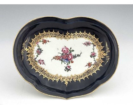 A Worcester polychrome floral strawberry dish, square seal mark, circa 1775, ogee heart shaped, the kidney form central carto