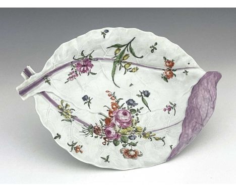 A Worcester polychrome large double leaf dish, circa 1765, relief moulded and painted with floral bouquet and sprigs, 36cm lo