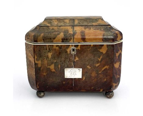 A Regency tortoiseshell tea caddy, circa 1820, of sarcophagus form, silver wire strung, white metal escutcheon, monogrammed p