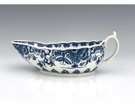 A Worcester blue and white sauce boat, circa 1765-70, reeded form, painted with the Donut pattern to the interior, 18.5cm lon