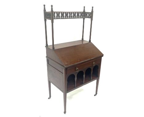 Liberty and Co., an Arts and Crafts walnut Medina writing bureau, circa 1880, in the Moorish style, the fall front below a fo