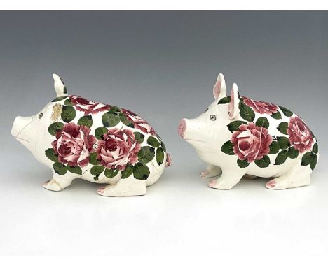 Jan Plichta, a Wemyss Ware painted pig, decorated with cabbage roses, modelled sitting printed marks, together with another e