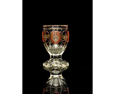 A Bohemian heraldic cameo glass vase, circa 1835, heavy slice cut chalice form with petal base, the central intaglio engraved