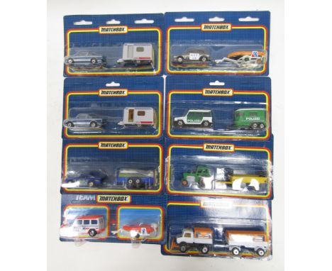Eight carded Matchbox diecast twin packs&nbsp;including 2 cars and caravans, Porsche car with glider on trailer, Polizei truc