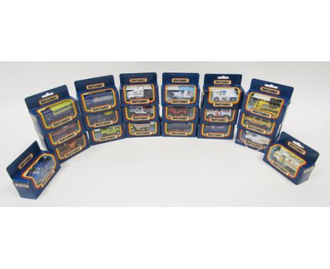 Twenty boxed Matchbox diecast vehicles including MB-60 Ford transit, MB-44 1921 model 'T' Ford, MB-53 dump truck, MB-39 Mack 