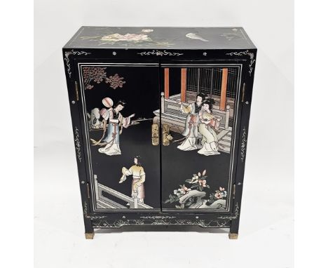 Chinese black lacquered cabinet&nbsp;with painted decoration of figures, birds and flowers, the two doors opening to fixed sh