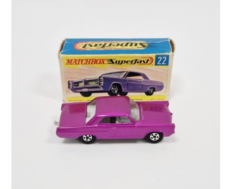 Matchbox Superfast No. 22 Pontiac GP Sports Coupe, light purple body, with a grey interior, narrow wheels, and a black base i