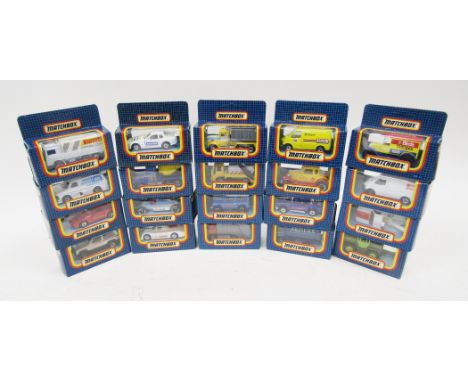 Twenty boxed Matchbox diecast vehicles including MB-27 tractor, MB-71 GMC wrecker, 2 x MB-59 Porsche 944, MB-27 Jeep Cherokee