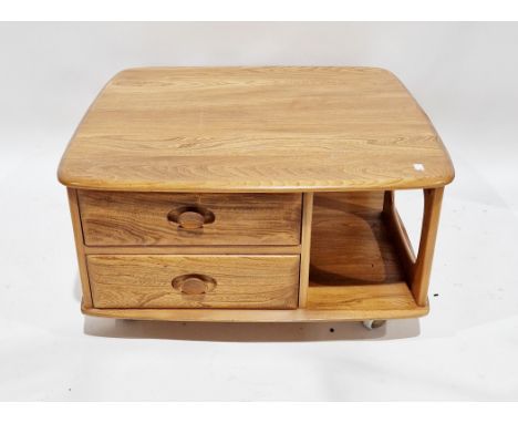 Ercol light elm Pandora's Box square coffee table&nbsp;with an arrangement of two drawers and three open bookshelves, raised 