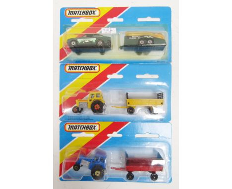 Three carded Matchbox Superfast diecast twin packs including TP-102 no.9 Ford Escort RS2000 and glider transporter and 2 x TP