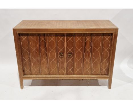 Mid century retro 1960's Gordon Russell ' Helix ' walnut sideboard, the double doors opening to a part shelf with drawer, 122