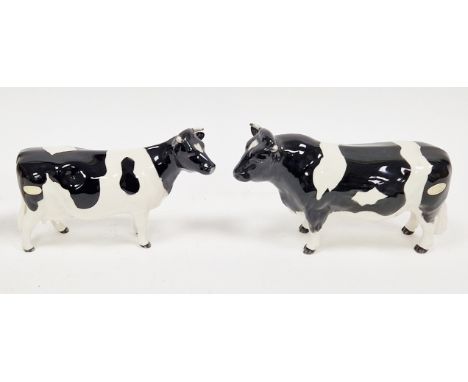Beswick model Fresian bull, CH Coddington Hilt Bar, and a Fresian cow&nbsp;CH Claybury Leegwater, largest 20cm long (2)&nbsp;