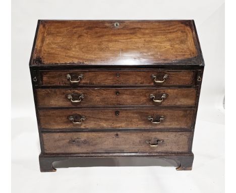 George III mahogany bureau, the fall front opening to a fitted interior of drawers and pigeonholes, the four long drawers wit