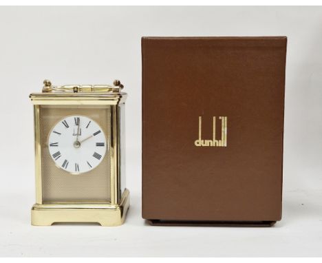 Dunhill brass repeater carriage clock&nbsp;having engine-turned face surrounding a white enamel dial, plain case, striking mo