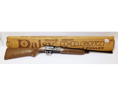 Boxed toy Daisy B.B gun, model 840 single pump pneumatic together with a boxed Bisley smallbore rifle scope