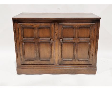 Ercol dark stained elm Old Colonial cabinet&nbsp;comprising two cupboard doors opening to a single shelf, 98cm wide x 49cm de