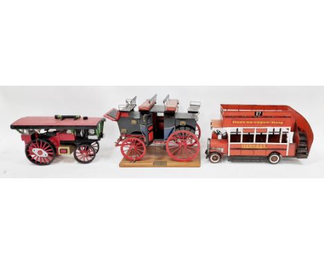 Painted scratch-bult model of a stagecoach on wooden plinth base 47cm long, scratch-built wooden model of a traction engine a