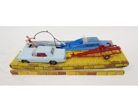 Corgi Toys Gift Set 31 Buick Riviera boat set, comprising of light blue Buick Riviera with red boat trailer, dolphin cabin cr