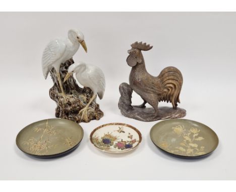 Japanese Meiji period (1868-1912) Satsuma saucer decorated with birds amongst flowering shrubs, the reverse with three-charac