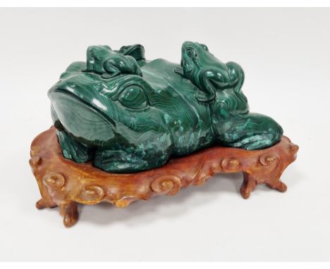 Large Chinese malachite carving of a bullfrog with three small frogs on its back, on a naturalistically carved hardwood stand