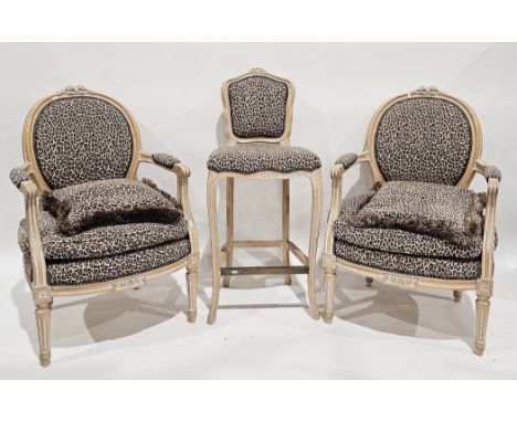 Pair of French-style Fauteuil elbow chairs with limed wooden frames and leopardskin patterned upholstery, each 64cm wide x 57