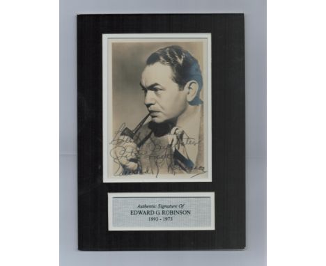 Edward G Robinson signed 12x8 inch overall mounted black and white vintage photo includes name plaque. Mounted to a high stan