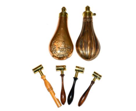 A Copper Powder Flask by G & J W Hawkesley, with fluted decoration, brass charger and steel spring - broken; a Copper Powder 