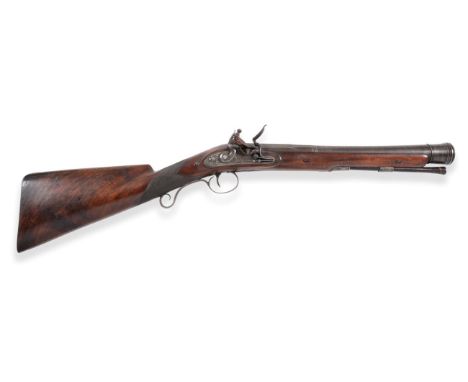 An Early 19th Century Flintlock Blunderbuss by Ryan & Son, London, the 38.5cm browned twist steel barrel octagonal at the bre