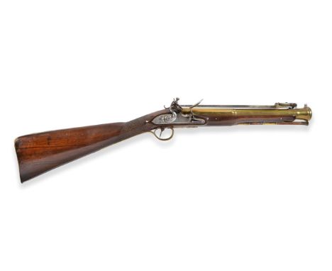 An 18th Century Flintlock Blunderbuss by Griffin, London, the 34cm two stage brass barrel octagonal at the breech and signed 