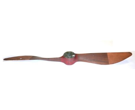 A First World War Laminated Mahogany Aeroplane Propeller, stamped AID/X64, the hub stamped DG T 28086/D 710/P/HP 150 H SUIZA/