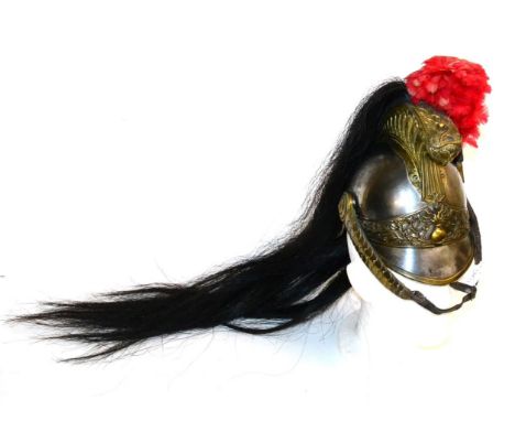 A French Second Empire Cuirassier's NCO's Helmet, with steel skull, peak and three lame neck guard with brass bound edges, th
