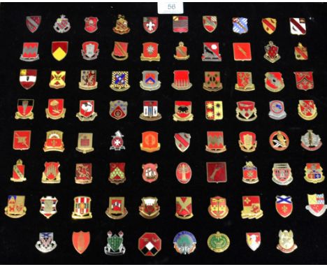 A Collection of Seventy Eight Distinctive Insignia Badges of the US Army Artillery Units, in enamelled gilt and white metal, 