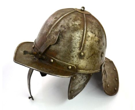 An East European Lobster Tail Helmet (Zischagge), the one piece skull with six ribs, set with a separate ring finial on a cir