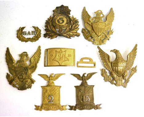 A Late 19th Century US Brass Shako Plate to the 5th Maryland Volunteers (The Dandys), the reverse with blade fixings for the 