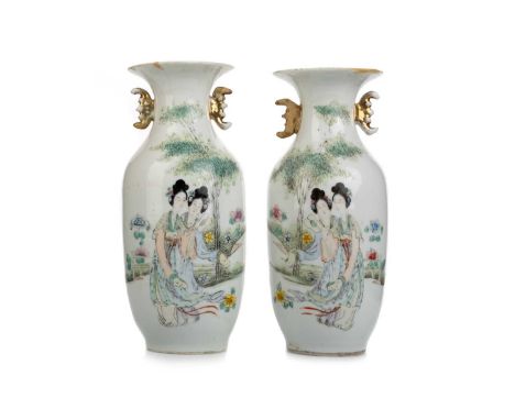 PAIR OF CHINESE FAMILLE ROSE PORCELAIN VASES, REPUBLIC PERIOD, EARLY 20TH CENTURY of baluster form with mirrored decoration, 