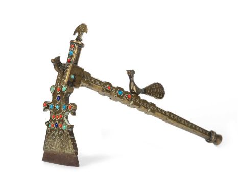 PERSIAN BRASS SUGAR AXE, LATE 19TH/EARLY 20TH CENTURY  set with various coloured cabochons and adorned by cockerels24cm long 