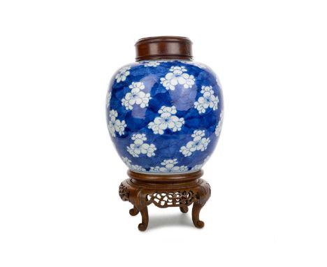 CHINESE PORCELAIN GINGER JAR, LATE 19TH/EARLY 20TH CENTURY decorated in blue and white with prunus, bearing double ring mark 