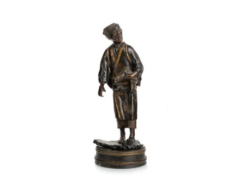 JAPANESE PARCEL GILT BRONZE OKIMONO, MEIJI PERIOD (1868-1912) modelled as an older gentleman wearing a kimono with gilt flora