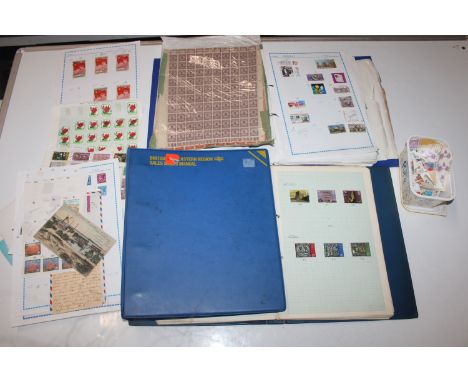 A box of stamp albums, loose First Day covers etc. 