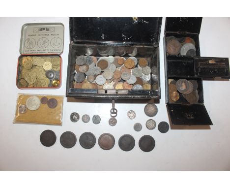 A cash tin and contents of coins to include GB milled George III 4pence; a Gordian III Antoninianus; and a Constantine bronze