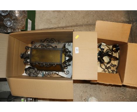 Two boxes containing various light fittings 