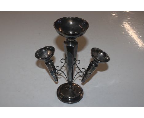 A silver epergne with weighted base