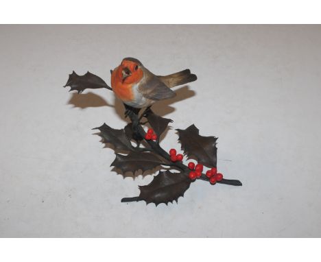 A Royal Worcester model "Robin On Holly" by James Alder