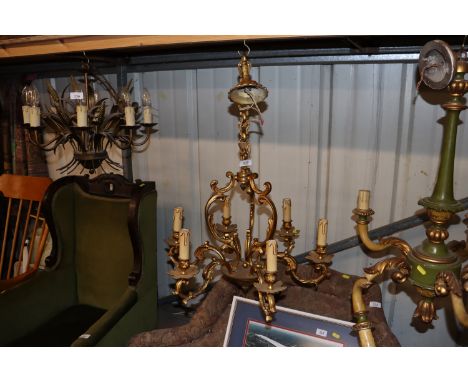 A French gilt bronze six branch chandelier 