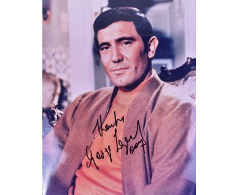 James Bond 007 - George Lazenby - On Her Majesty's Secret Service - a signed 8x10" colour photograph from the movie. Signed n