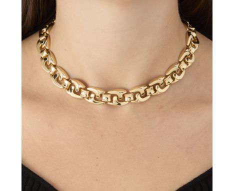 14k yellow gold jumbo mariner link necklace. The necklace of curved form and lays nicely. With box clasp and safety latch. Ma