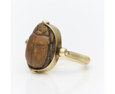 14k yellow gold ring or pendant set with carved steatite scarab. The scarab realistic rendered and detailed. The underside ca