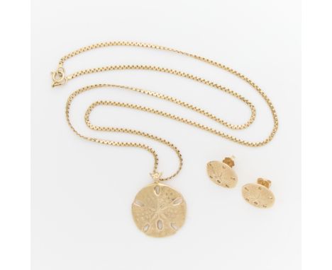 Group of three pieces of 14k yellow gold sand dollar form jewelry. Including:One 14k gold sand dollar form pendant, unmarked 