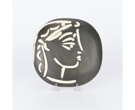 Pablo Picasso (Spanish, 1881-1973). White earthenware studio ceramic plaque with black engobe titled "Profil de Jacqueline (J