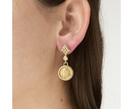 Pair of yellow gold 18k diamond and gold coin earrings. Comprised of an arrow shape set with none full cut diamonds each, sus